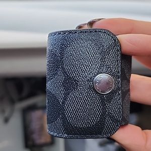 COPY - NWOT Coach Earbud case in black signature